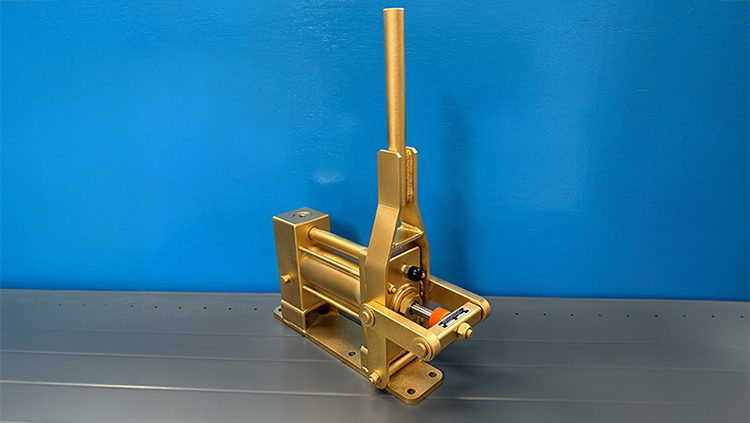 Photo of the golden spray-painted Hand pump by MAKEEN Gas Equipment United Kingdom